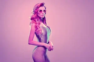sexy woman in fishnet stockings and shiny top