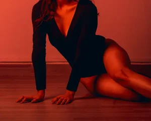 Young escort sitting